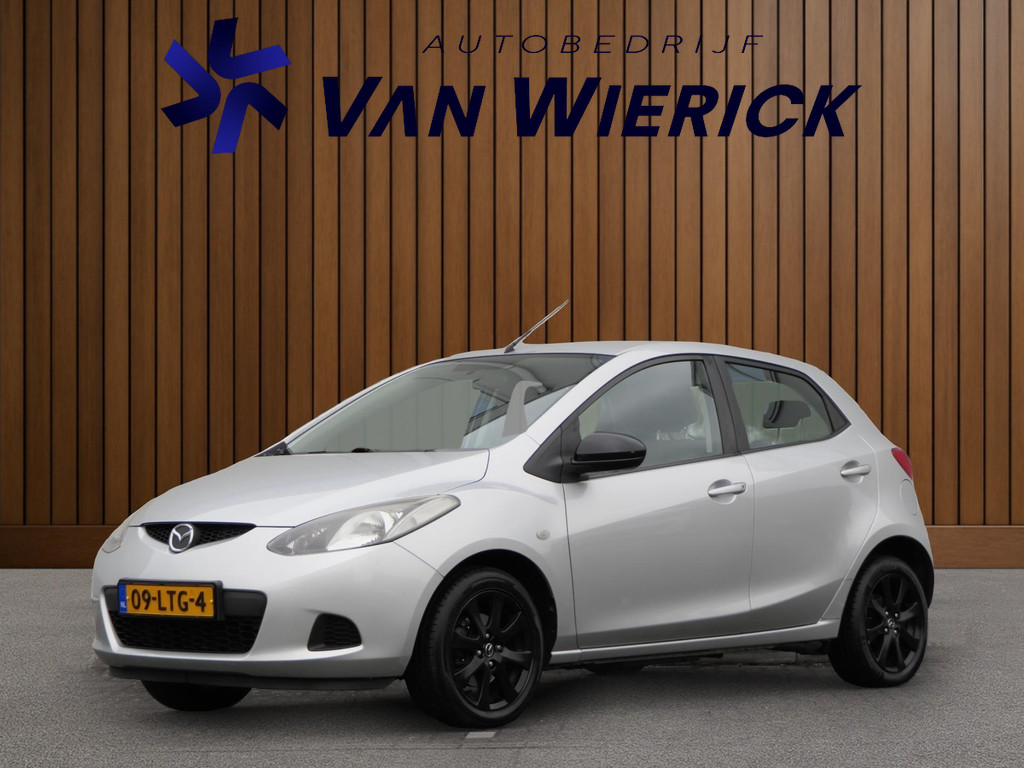 Mazda 2 1.3 TS 5-Deurs | Cruise Control | Airco | LM Velgen 51508997-0.jpg | Autobedrijf van Wierick