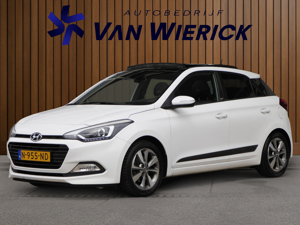 Hyundai i20 1.0 T-GDI Premium 120PK | Schuifdak | Camera | Cruise | Clima | Trekhaak | LM Velgen 55724647-0.jpg | Autobedrijf van Wierick
