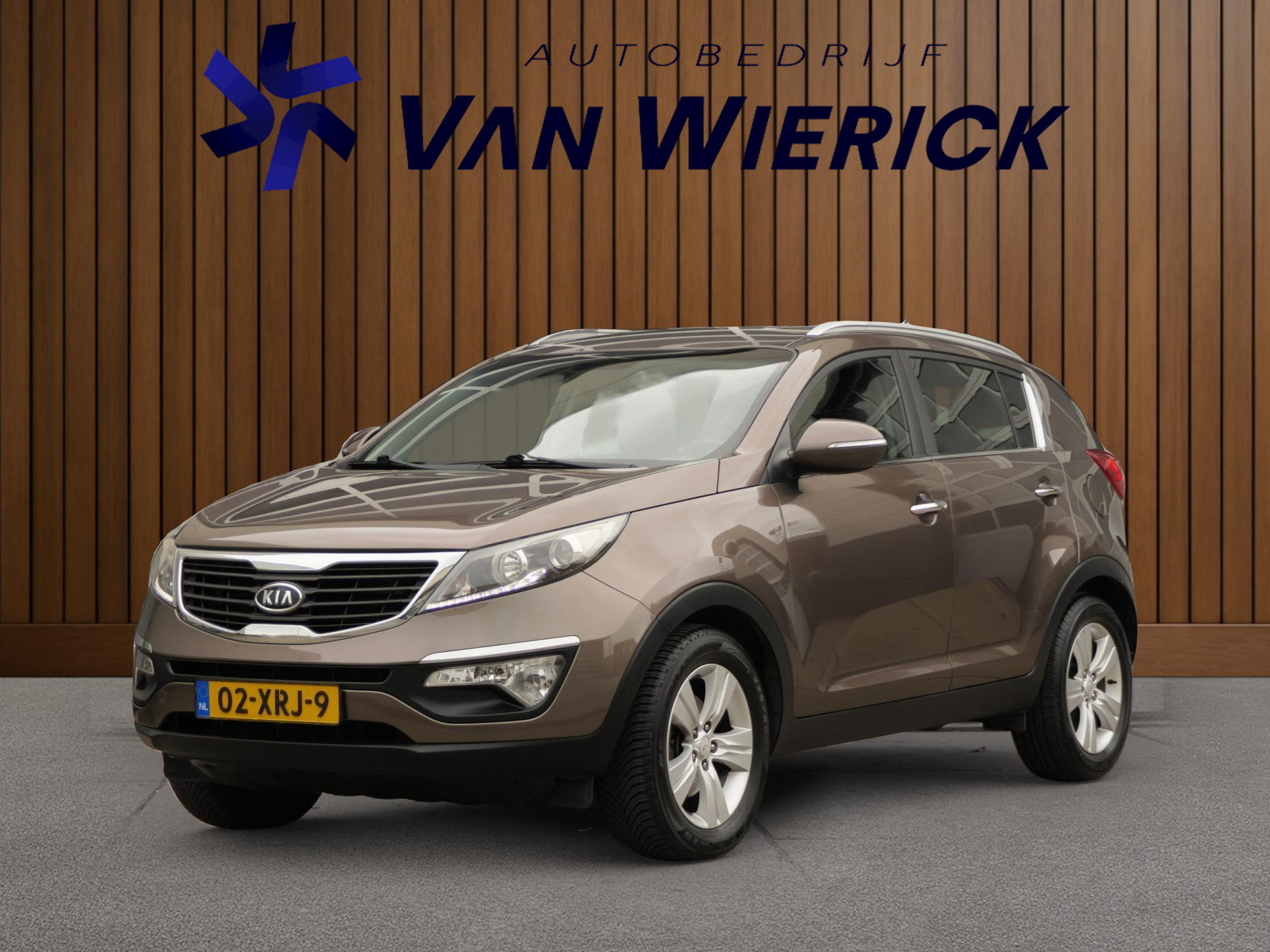Kia Sportage 1.6 GDI X-ecutive Plus Pack 135PK | Cruise | Half leer/stof | Camera | Bluetooth | 48352153-0.jpg | Autobedrijf van Wierick